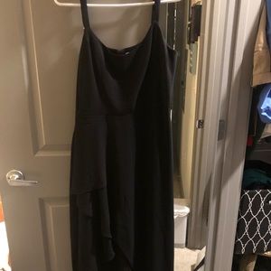 Black floor length dress. Opens on the side. Very cute and elegant.